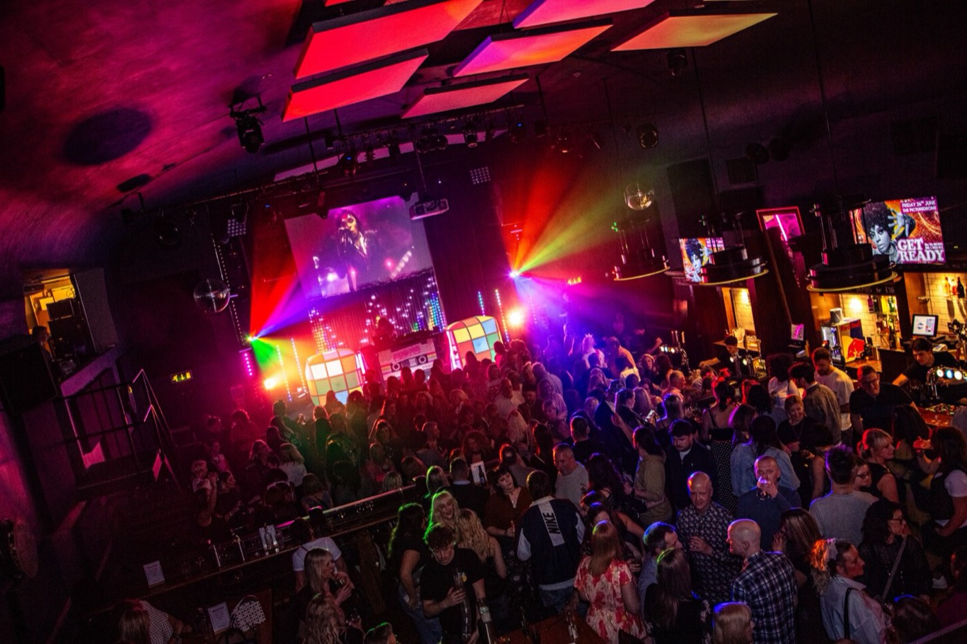 The Picturedrome packed for an 80s night, lights and balcony